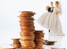 Stack of Coins and Bride and Groom Wedding Cake Decorations