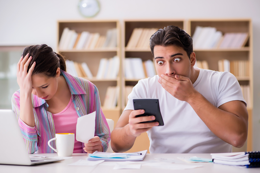 Young family discussing family finances